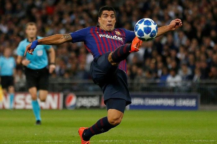 Barcelona's Luis Suarez is expected to be out for two weeks with a knee injury.