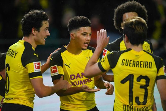 English midfielder Jadon Sancho (centre) is making a big impact in the Bundesliga