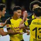 English midfielder Jadon Sancho (centre) is making a big impact in the Bundesliga