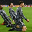 Bayern Munich's French winger Kingsley Coman (L) celebrates with Polish forward Robert Lewandowski (C) and Leon Goretzka in the trilling 3-3 draw at Ajax on Wednesday in Amsterdam.