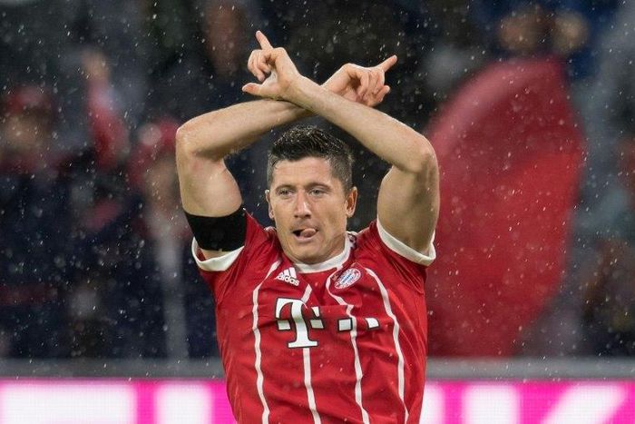 Bayern Munich's Polish forward Robert Lewandowski celebrates scoring a goal during the German First division Bundesliga football match against Leverkusen August 18, 2017