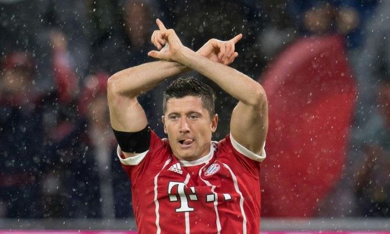 Bayern Munich's Polish forward Robert Lewandowski celebrates scoring a goal during the German First division Bundesliga football match against Leverkusen August 18, 2017