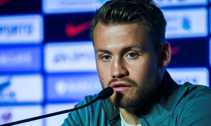 Liverpool player Simon Mignolet speaks at a press conference in Hong Kong on July 18, 2017
