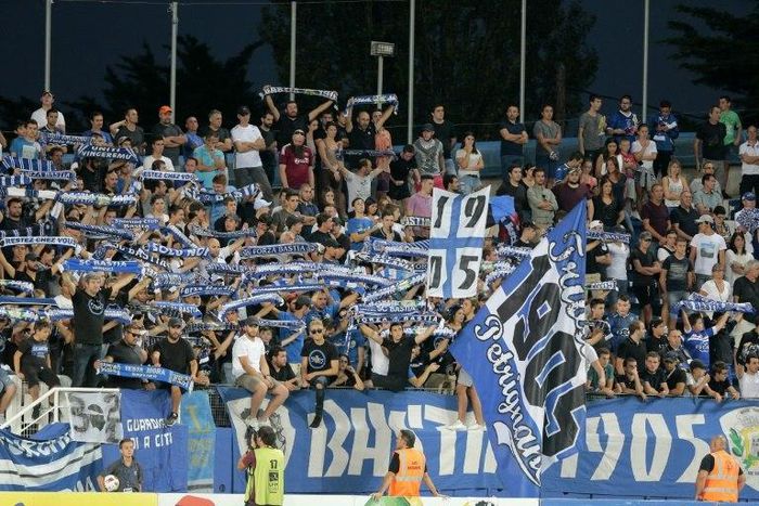 Bastia's fans cheer during the French Ligue 1 football match against Toulousen September 10, 2016 at the Armand-Cesari stadium in Bastia on the French Mediterranean island of Corsica