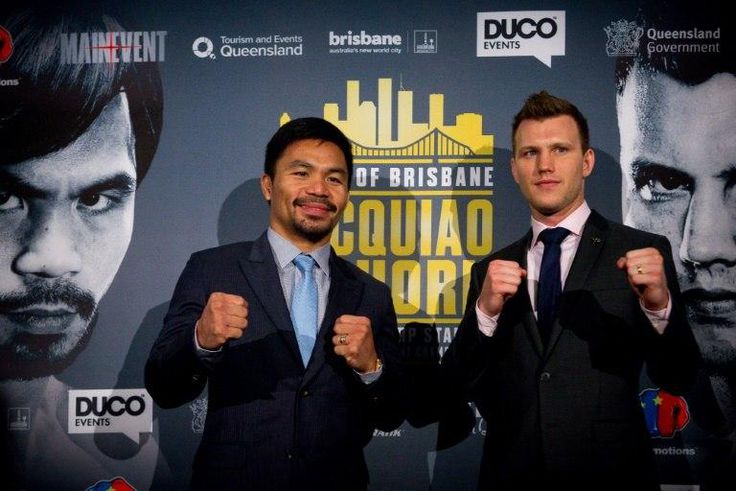 World Boxing Organization (WBO) welterweight defending champion Manny Pacquiao (L) of the Philippines poses for photos with Australian contender Jeff Horn during a press conference in Brisbane, in April 2017