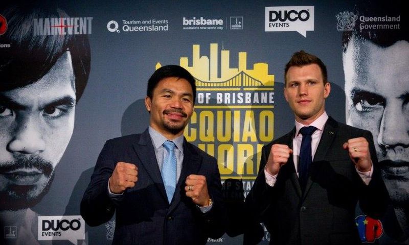 World Boxing Organization (WBO) welterweight defending champion Manny Pacquiao (L) of the Philippines poses for photos with Australian contender Jeff Horn during a press conference in Brisbane, in April 2017