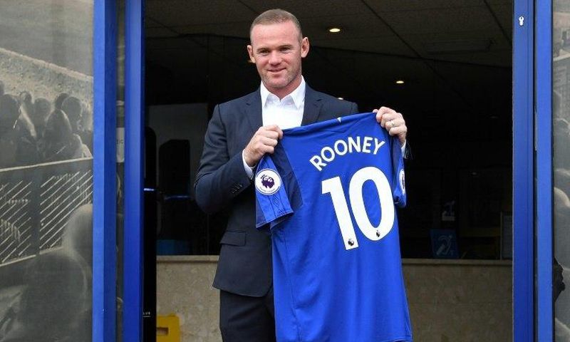 Everton's new signing Wayne Rooney poses for a photograph with his club shirt at Goodison Park in Liverpool on July 10, 2017