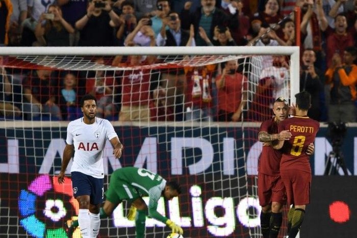 Radja Nainggolan and Diego Perotti (R) of AS Roma celebrate after scoring a goal against Tottenham Hotspur during their International Champions Cup (ICC) match, at Red Bull Arena in Harrison, New Jersey, on July 25, 2017