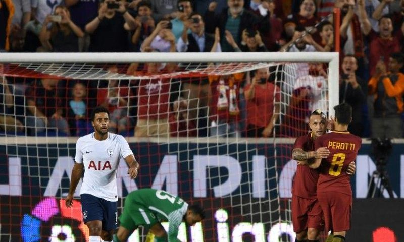 Radja Nainggolan and Diego Perotti (R) of AS Roma celebrate after scoring a goal against Tottenham Hotspur during their International Champions Cup (ICC) match, at Red Bull Arena in Harrison, New Jersey, on July 25, 2017