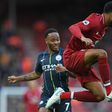Liverpool defender Joe Gomez (right) faces a lengthy spell on the sidelines after a leg fracture