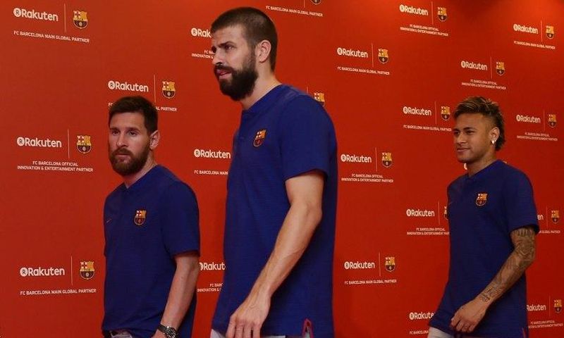 (From L) Barcelona players Lionel Messi, Gerard Pique, and Neymar arrive at a team event in Tokyo on July 13, 2017, following a press conference to announce new sponsorship with Japanese internet retailer Rakuten