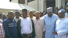 CAF President Ahmad recites Qur'an in the company of Nyantakyi in the mosque