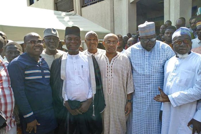 CAF President Ahmad recites Qur'an in the company of Nyantakyi in the mosque