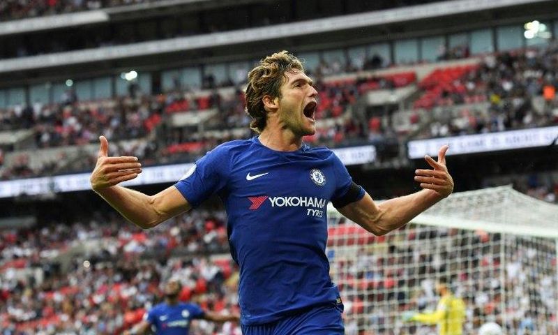 Chelsea's defender Marcos Alonso celebrates after he scored their second goal against Tottenham Hotspur on August 20, 2017