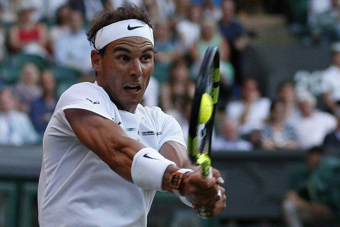 Spain's Rafael Nadal returns against US player Donald Young during their men's singles second round match on the third day of the 2017 Wimbledon Championships July 5, 2017