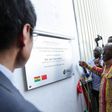 President Akufo-Addo unveils the plaque for the commissioning of the diaper making factory