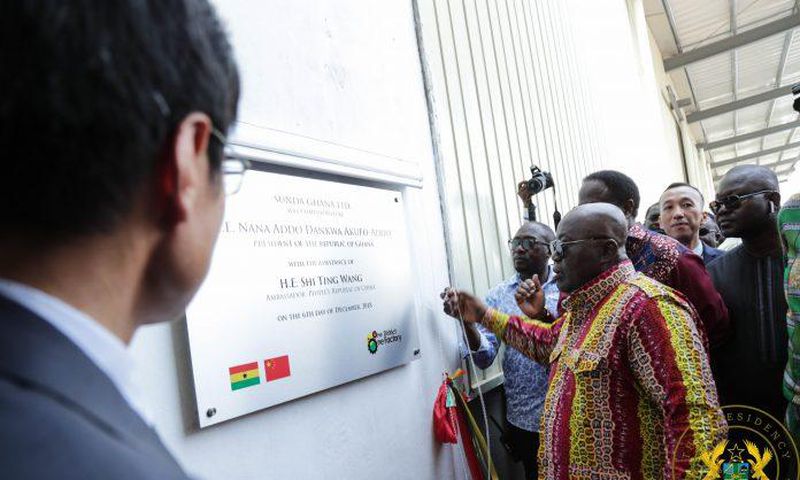 President Akufo-Addo unveils the plaque for the commissioning of the diaper making factory