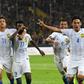 Malaysian players celebrate after scoring winning goal against Indonesia during their 29th Southeast Asian Games (SEA Games) football semi-final match, at Shah Alam Stadium outside Kuala Lumpur, on August 26, 2017