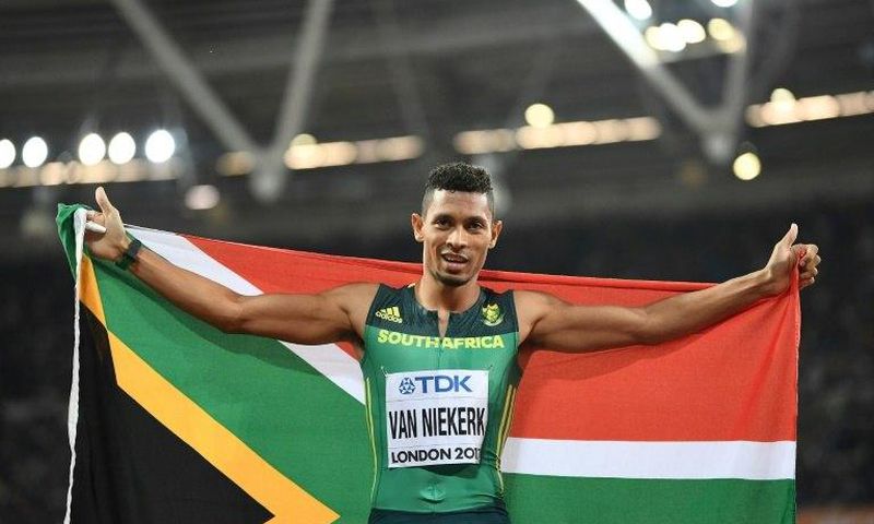South Africa's Wayde Van Niekerk celebrates after winning the final of the men's 400m at the 2017 IAAF World Championships in London on August 8, 2017