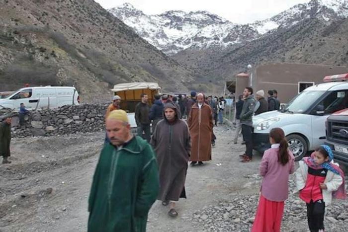 An image grab from a video broadcast by Moroccan news channel KECH24 on December 18, 2018 shows people at the site where the bodies of two murdered Scandinavian tourists were found in the High Atlas mountains