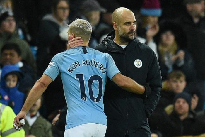 Manchester City manager Pep Guardiola consoles striker Sergio Aguero after his side's defeat by Crystal Palace
