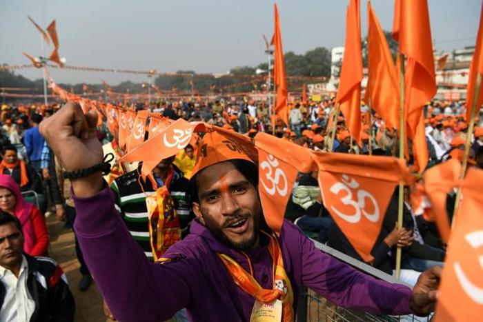Devotees clad in saffron filled a huge parade ground in the Indian capital under tight security