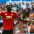 Manchester United's striker Romelu Lukaku celebrates scoring the team's second goal during the English Premier League football match against Swansea City August 19, 2017