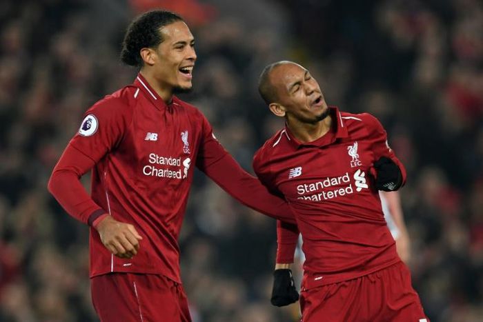 Liverpool's Fabinho and Virgil van Dijk celebrate their rout of Newcastle