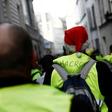 A yellow vest protestor with a Christmas hat walks in the Montmartre area in Paris, one of several demonstrations across France, albeit numbers were down on previous rallies