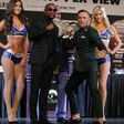 Floyd Mayweather and Connor Mcgregor pose during a media press conference in Las Vegas, Nevada