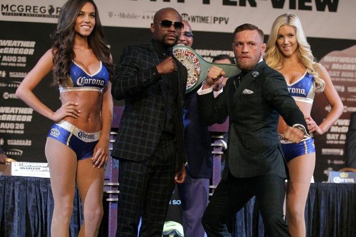 Floyd Mayweather and Connor Mcgregor pose during a media press conference in Las Vegas, Nevada