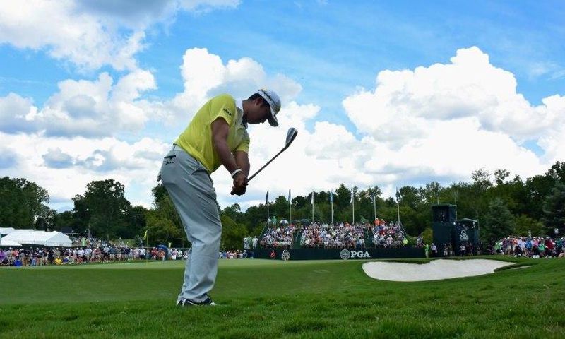 Hideki Matsuyama of Japan plays his shot on the ninth hole during the third round of the 2017 PGA Championship at Quail Hollow Club in Charlotte, North Carolina, on August 12, 2017