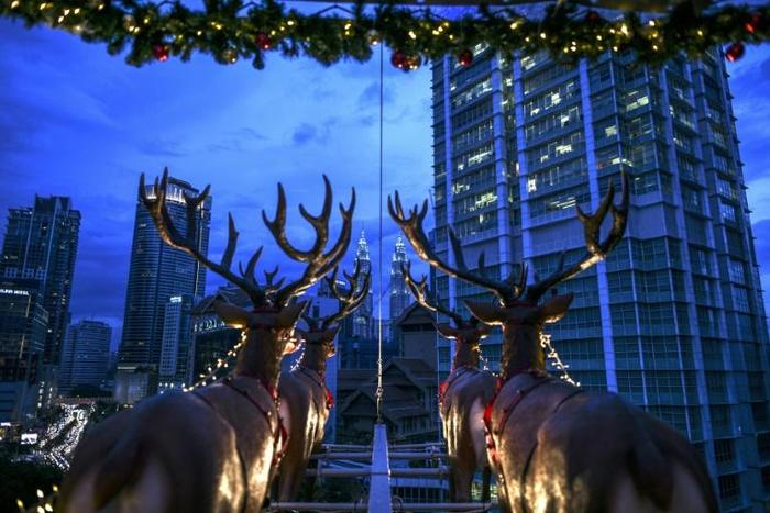 Santa's reindeer, featured here as part of the design of the Santa in the Sky restaurant in Kuala Lumpur, Malaysia, have been tracked by the Defense Department since 1955