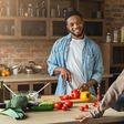 African American Couple Cooking.