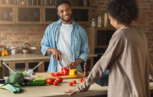 African American Couple Cooking.