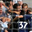 Tottenham's English midfielder Dele Alli (L) celebrates scoring the opening goal during the English Premier League match against Newcastle at St James' Park in Newcastle-upon-Tyne, northeast England on August 13, 2017