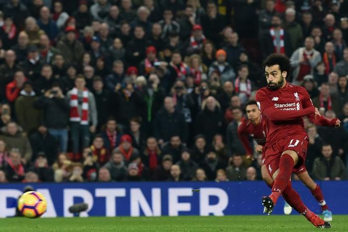 Spot on: Mohamed Salah scored as Liverpool beat Newcastle 4-0 to go six points clear at the top of the Premier League