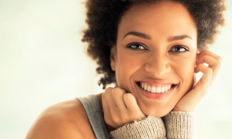 ___7013032___https:______static.pulse.com.gh___webservice___escenic___binary___7013032___2017___7___18___23___166669575-African-American-Woman-Smiling