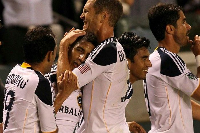 Pictured here in 2011, 45-year-old Gregg Berhalter (C) has won 44 caps for the United States between 1994 and 2006, and played in two World Cups
