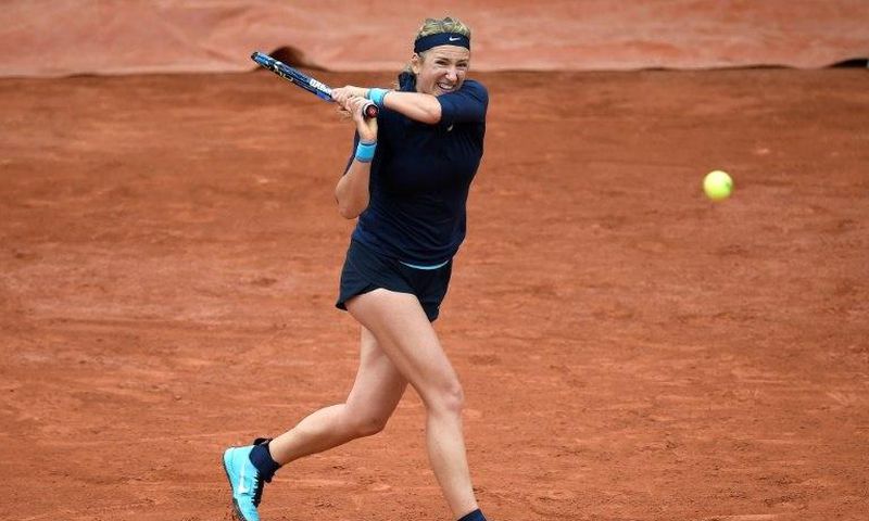 Belarus' Victoria Azarenka returns the ball to Italy's Karin Knapp during their women's first round match at the Roland Garros 2016 French Tennis Open in Paris on May 24, 2016