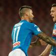 Napoli's midfielder Piotr Zielinski (R) celebrates after scoring with teammate during the Italian Serie A football match against Atalanta August 27, 2017