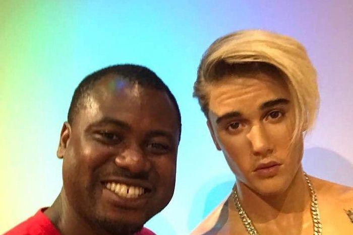 Abeiku Santana shares photo with Justin Bieber's wax figure