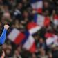 France's forward Olivier Giroud (L) celebrates after scoring a goal against Uruguay