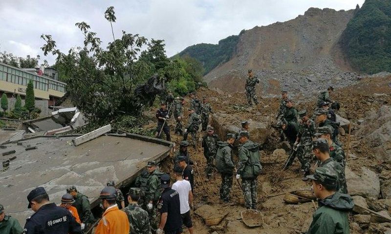 Rescuers are continuing to search for those missing after Monday's disaster in a township in Bijie city in Guizhou province