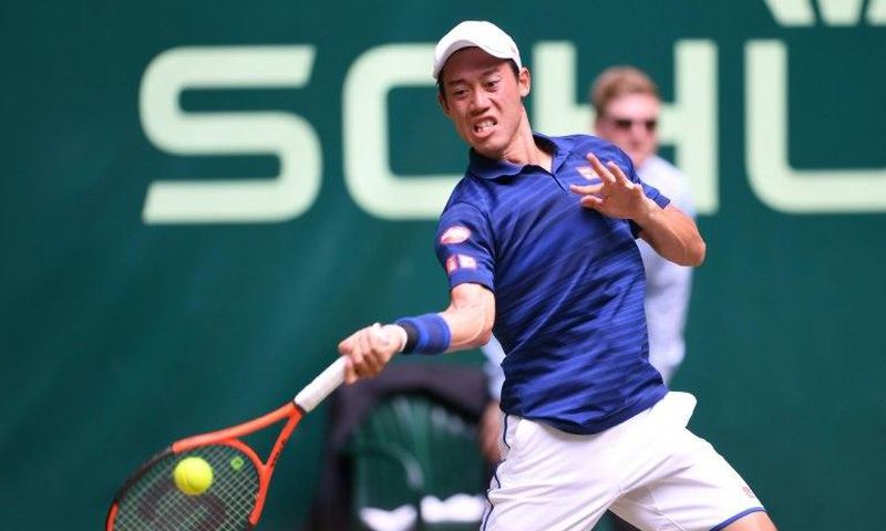 Kei Nishikori from Japan plays against Karen Khachanov from Russia during the ATP tournament tennis match in Halle, western Germany, on June 22, 2017