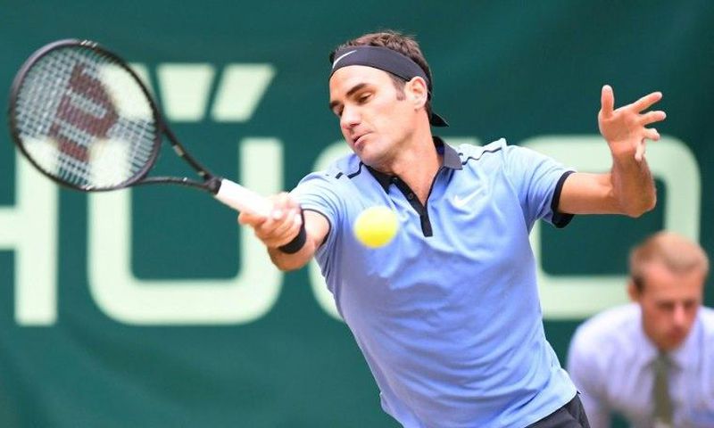 Roger Federer returns a ball to German opponent Alexander Zverev in the final of the Gerry Weber Open tournament in Halle, western Germany, on June 25, 2017