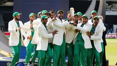 Pakistan's Sarfraz Ahmed (3rdR) lifts the trophy as Pakistan players celebrate their win at the ICC Champions Trophy on June 18, 2017