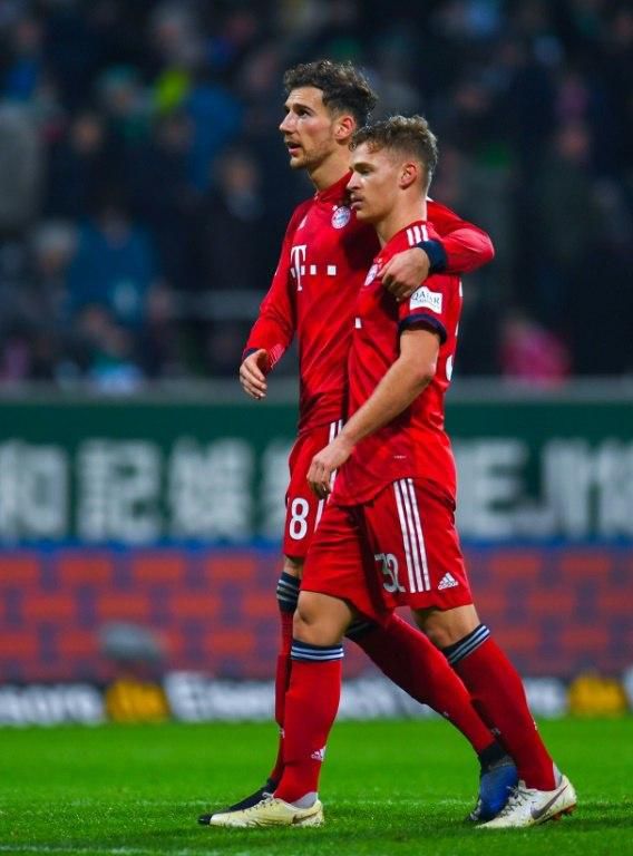 Bayern Munich midfielders Joshua Kimmich (R) and Leon Goretzka (L) have profited from the decision by head coach Niko Kovac to abandon squad rotation with three wins in the build-up to Wednesday's key Champions League clash at Ajax.