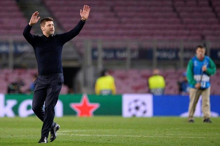 Spurs' Mauricio Pochettino celebrates his team's qualification for the next round of the Champions League