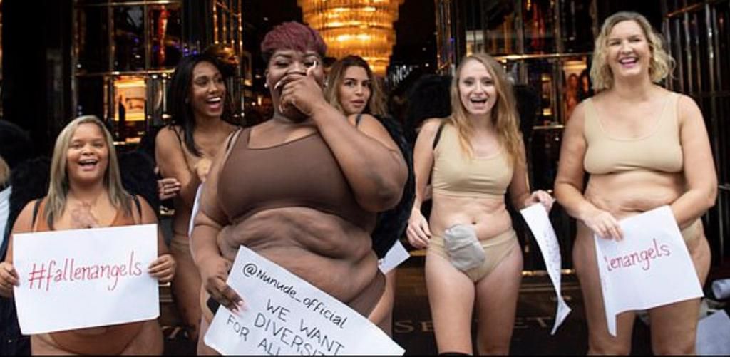 Plus-size women strip to their bikini to protest against Victoria's Secret